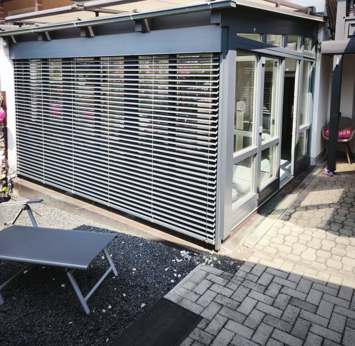 Wintergarten mit Raffstores